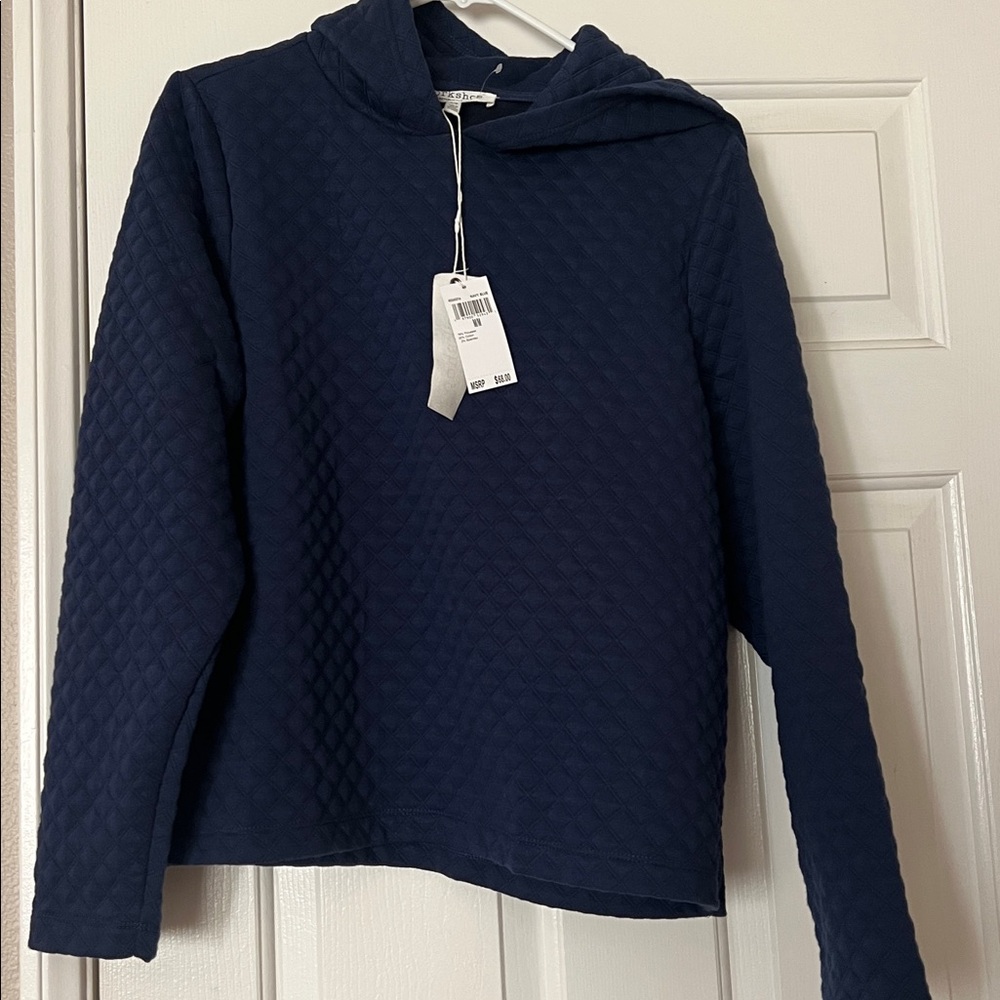 NWT Navy blue quilted sweatshirt with hood. Size Medium. Soft & cozy.
